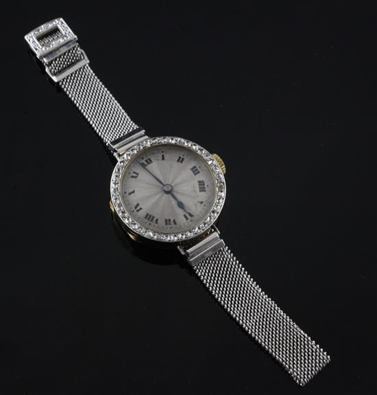 An early 29th century 18ct gold and diamond cocktail watch,